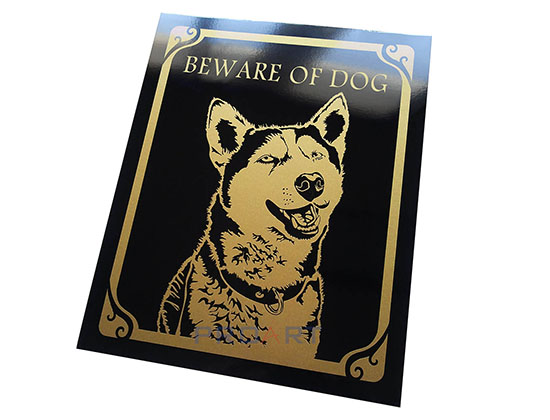 an individual metal plate with a dog, a unique gadget for a dog